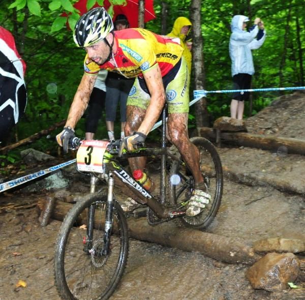 Jose Antonio Hermida Ramos (Multivan Merida Biking Team) over the log steps.