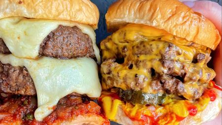A photo of two 7bone burgers. 