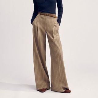 flat lay of woman in wide-leg trousers