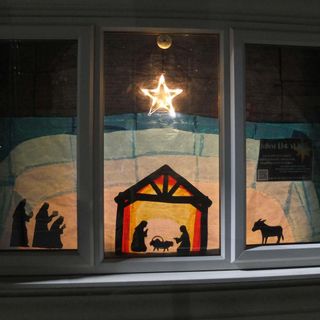 advent window with nativity scene