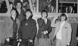 Midas Man Brian Epstein with the Beatles.