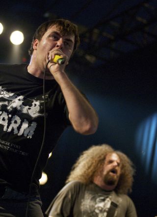 Napalm Death's Greenway and Shane Embury at the 2007 Download Festival