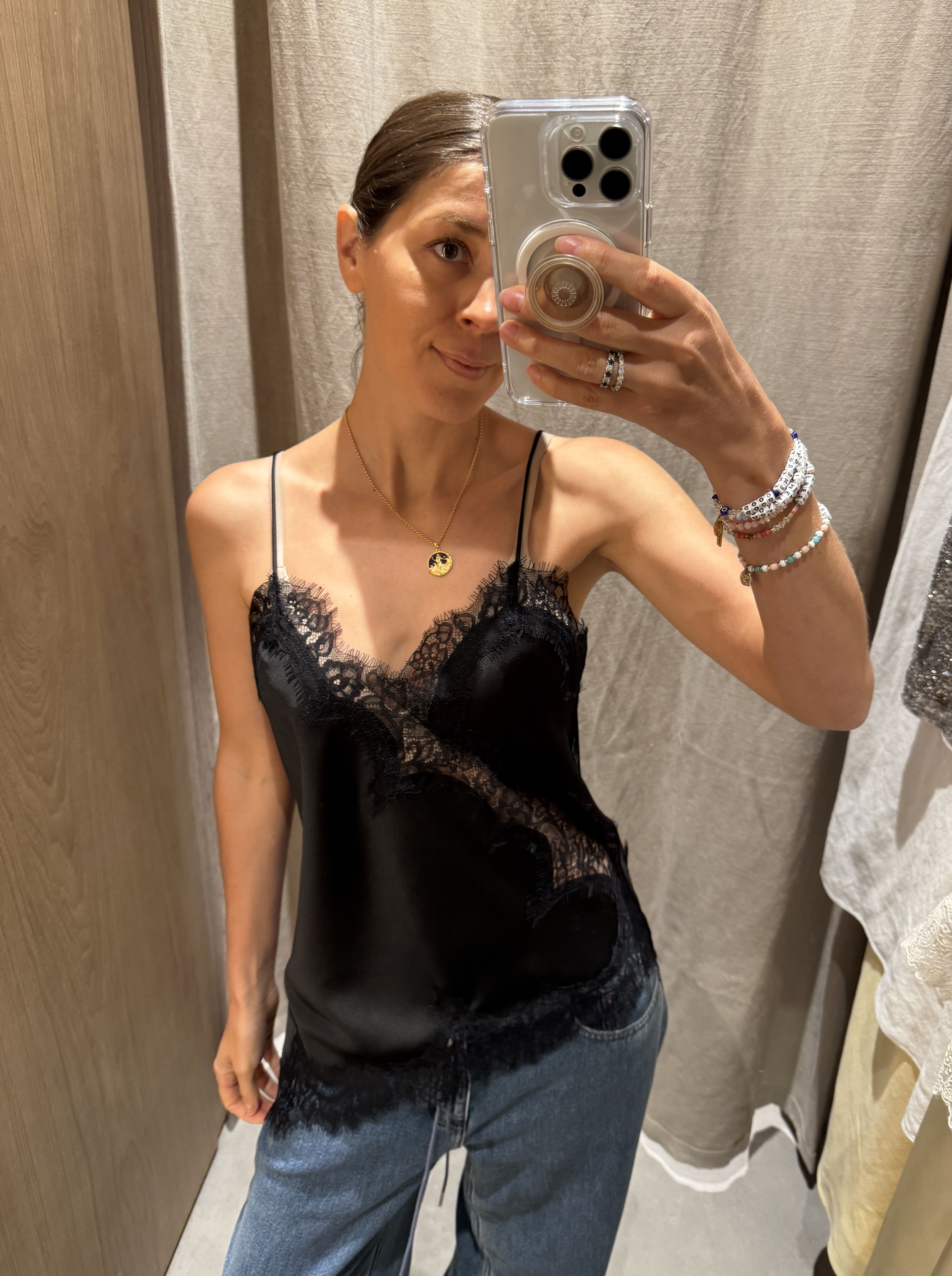 Female on black suspender mirror