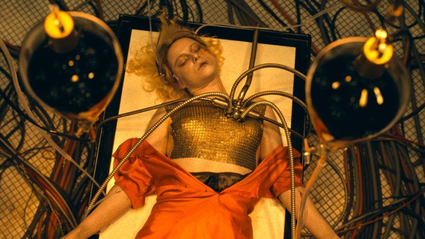 The Bride lying on table with tubes coming out of her chest in The Bride!