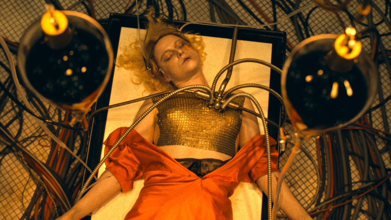 The Bride lying on table with tubes coming out of her chest in The Bride!