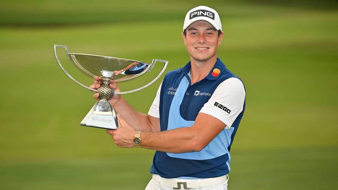 Viktor Hovland with the FedEx Cup trophy