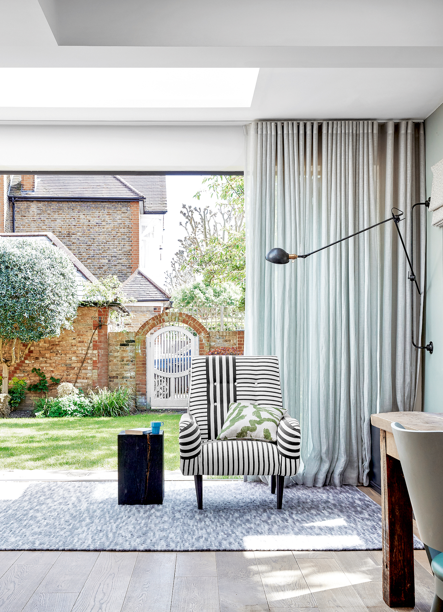 living room with sheer curtains