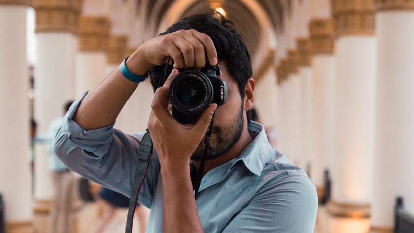 Photographer taking a travel portrait