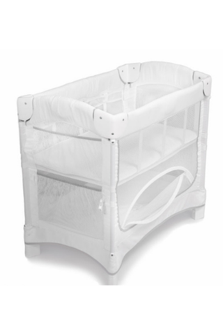 Best bassinets, image shows mesh breathable bassinet with storage layer