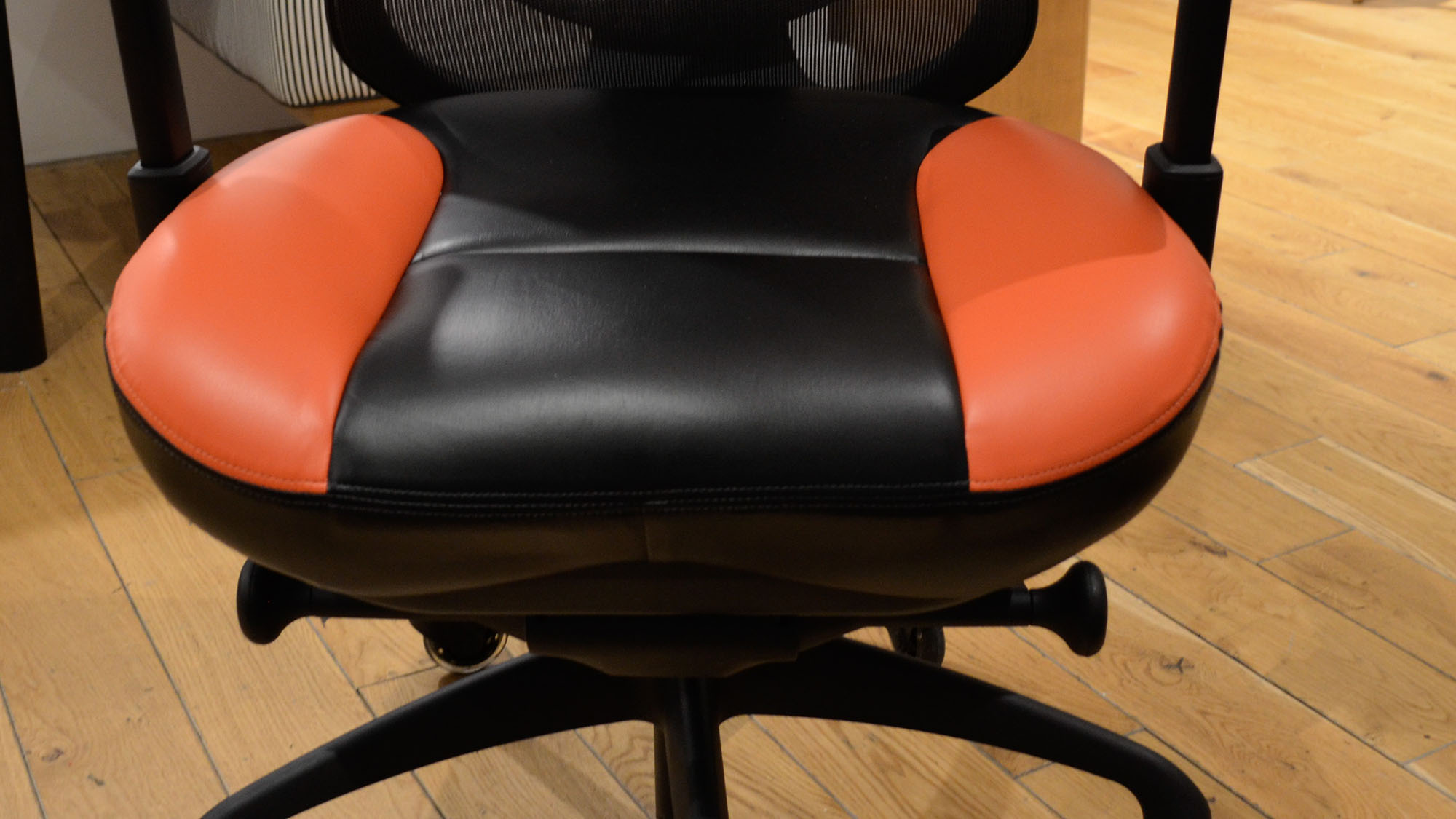 A BodyBilt G7 gaming chair in an office