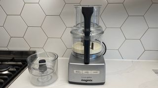 The Magimix 4200XL being used to whip cream