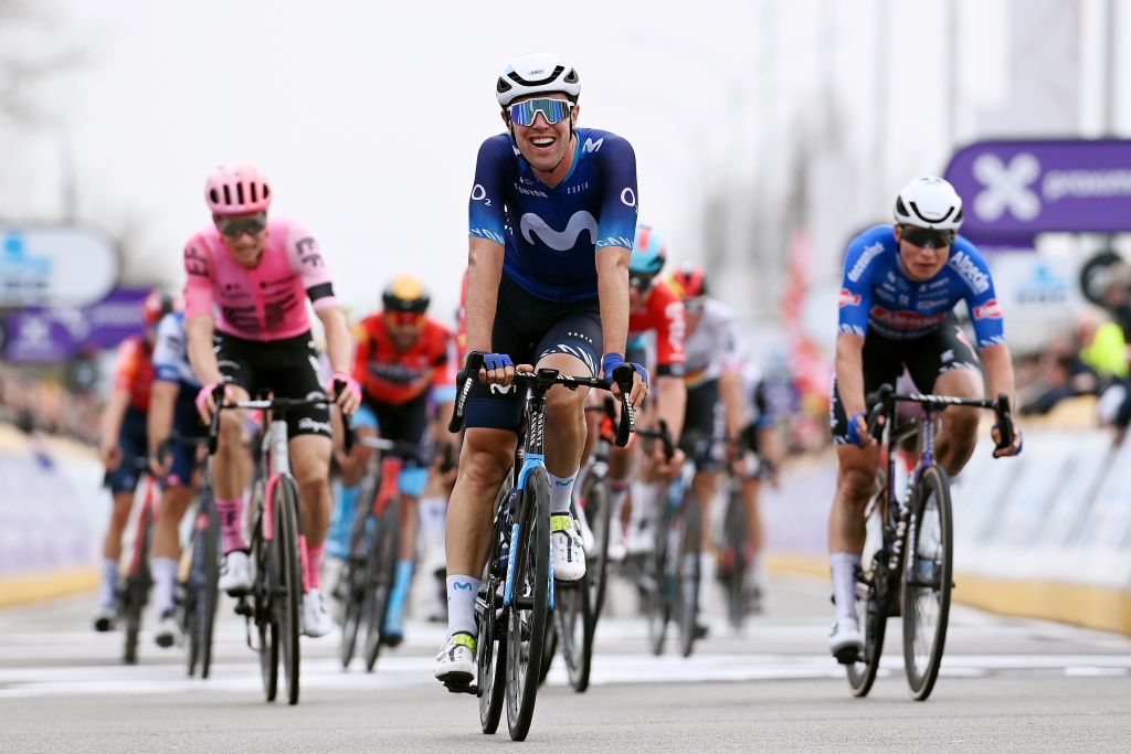 WAREGEM BELGIUM MARCH 29 Oier Lazkano Lopez of Spain and Movistar Team celebrates at finish line as second place during the 77th Dwars Door Vlaanderen 2023 Mens Elite a 1837km one day race from Roeselare to Waregem DDV23 on March 29 2023 in Waregem Belgium Photo by Tim de WaeleGetty Images