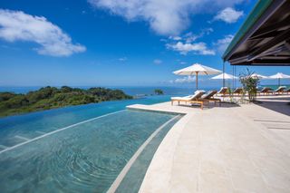 The infinity pool at the Three Sixty Hotel overlooks the water in Costa Rica