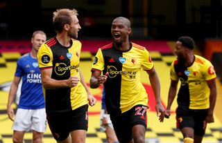 Craig Dawson (left) secured an injury-time point against Leicester with his first Hornets goal.