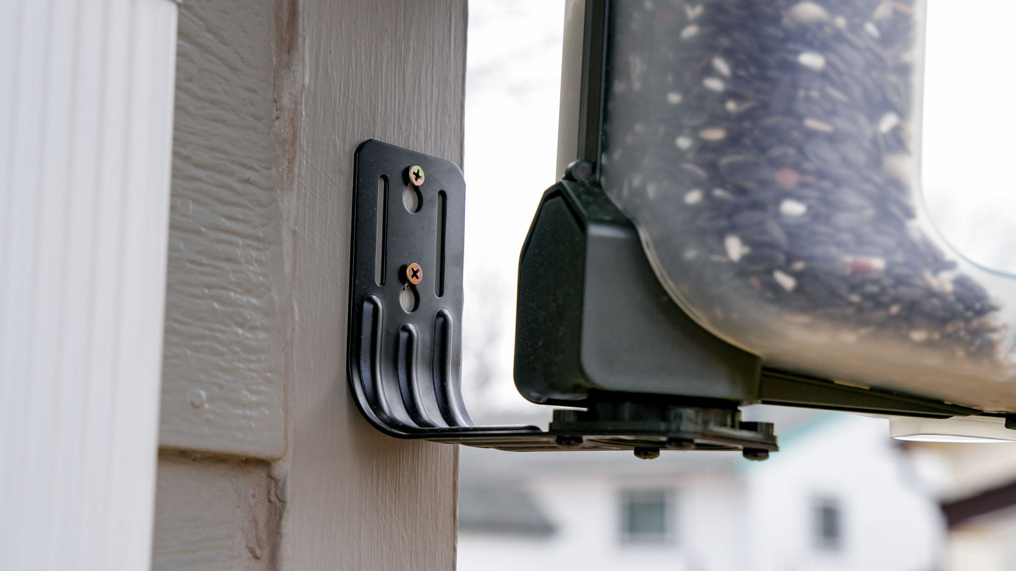 Close up of the mounting bracket for a Feathersnap Scout Bird Feeder.
