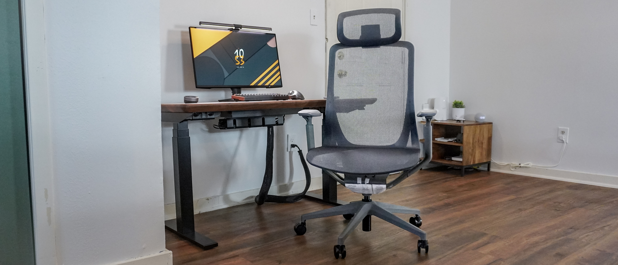 The Branch Aire Chair in front of a desk