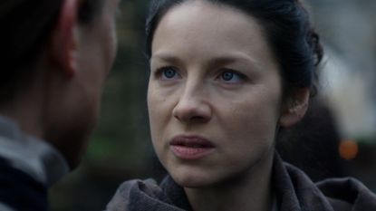 Caitriona Balfe (as Claire Randall Fraser), Sam Heughan (as Jamie Fraser).