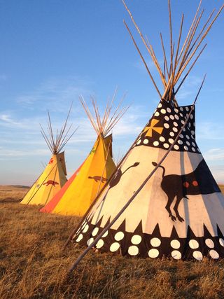 Teepee lodges at the ceremonial treaty signing on Blackfeet lands in Montana.