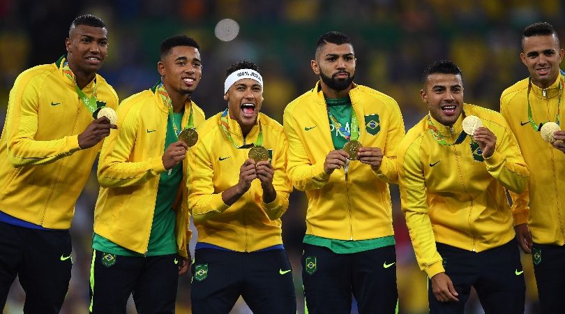 Neymar and his Brazil team-mates celebrate with their gold medals after winning the men&#039;s football tournament at the Rio Olympics in 2016.