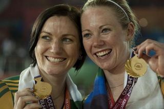Australia's Anna Meares and Kaarle Mcculloch show off their gold medals from the team sprint.