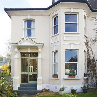 villa with windows and porch