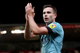 Josh Cullen of Burnley applauds fans following their sides victory after the Sky Bet Championship match between Stoke City and Burnley at Bet365 Stadium on December 30, 2022 in Stoke on Trent, England.