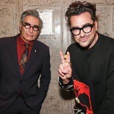 Eugene Levy and Dan Levy are seen during the "Best Wishes, Warmest Regards" book launch at The Beacon Theatre on October 25, 2021 in New York City.