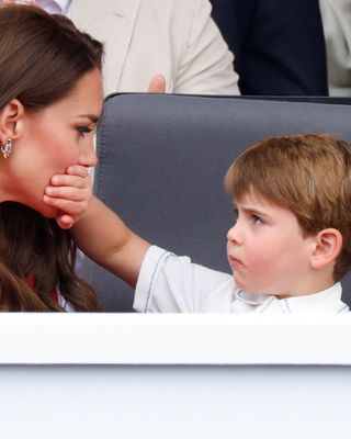 Cheeky Prince Louis covering Princess Catherine's mouth