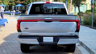 Rear view of the Ford F-150 Lightning in parking lot