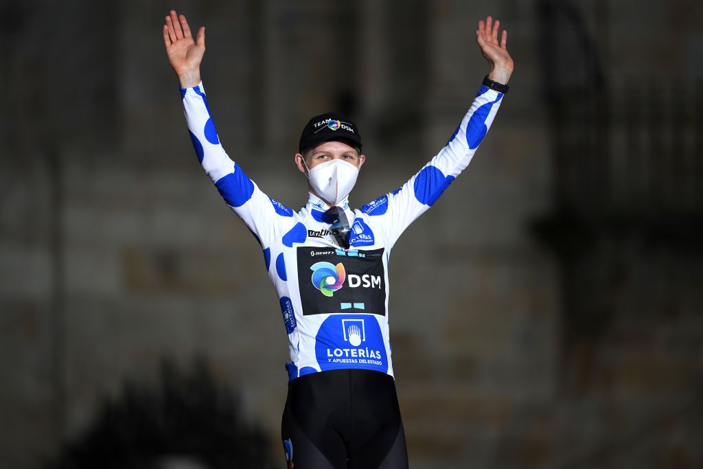 SANTIAGO DE COMPOSTELA SPAIN SEPTEMBER 05 Michael Storer of Australia and Team DSM celebrates winning the polka dot mountain jersey on the podium ceremony after the 76th Tour of Spain 2021 Stage 21 a 338 km Individual Time Trial stage from Padrn to Santiago de Compostela lavuelta LaVuelta21 ITT on September 05 2021 in Santiago de Compostela Spain Photo by Tim de WaeleGetty Images