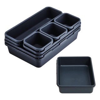 A set of blue bathroom drawer organizers