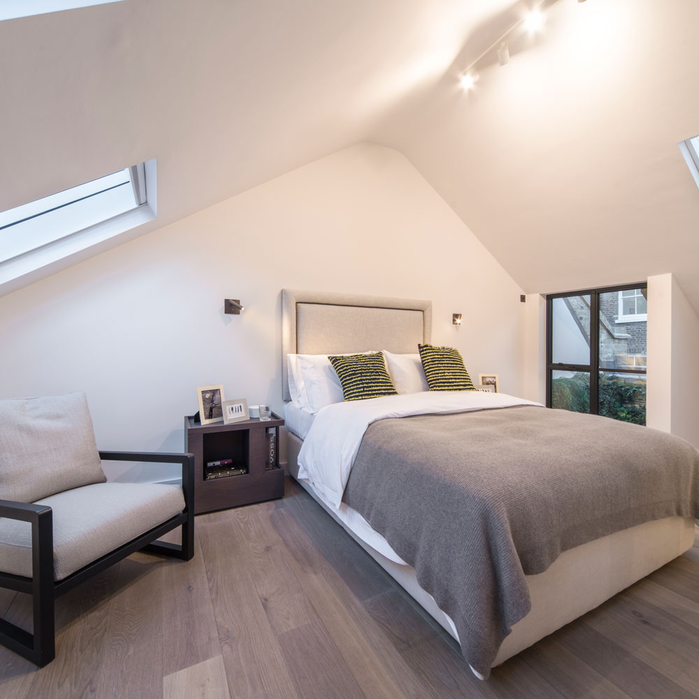 ellie goldings house bedroom with element of natural light bed and cuhions and sofa