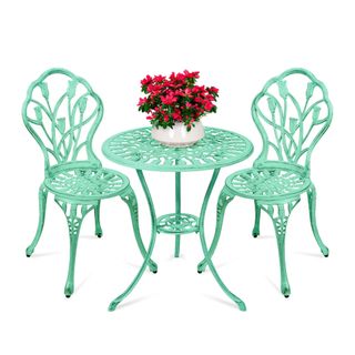 Mint green bistro set in metal with intricate detailing