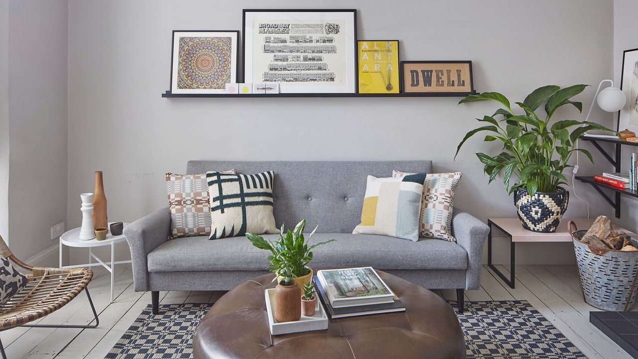 living room with wooden flooring and photoframe on wall