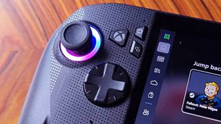 Close up of Xbox button on Asus ROG Xbox Ally X handheld.