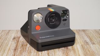 Polaroid Now camera on a counter top