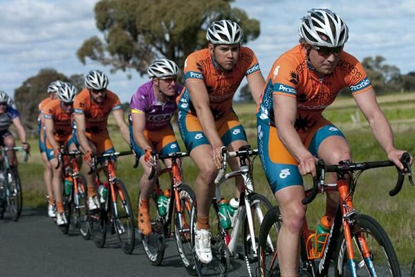 Genesys Wealth Advisers was on the front of the peloton protecting their tour leader, Joel Pearson, in purple.