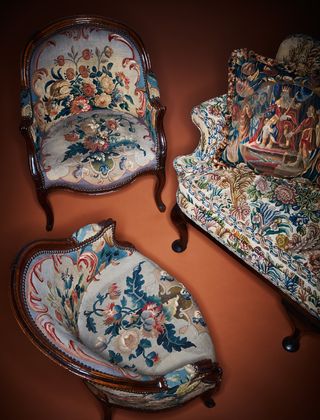 Rockefeller collection A pair of Louis XV walnut bergeres, a George I walnut settee and a Dutch tapestry cushion