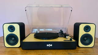 House of Marley Revolution Bluetooth turntable on a wooden surface