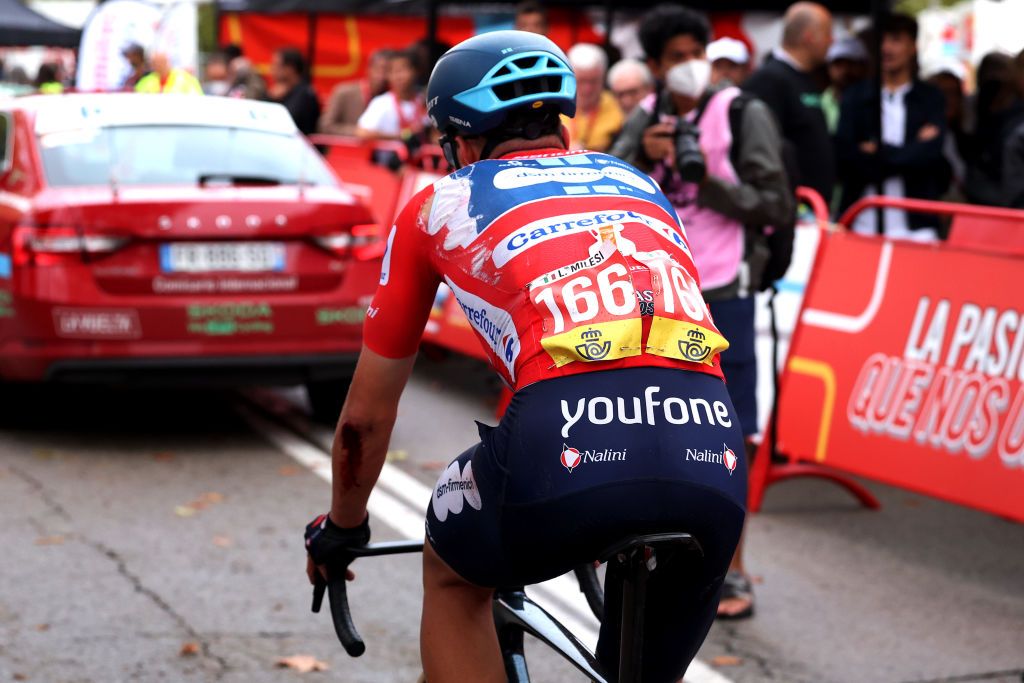 BARCELONA SPAIN AUGUST 27 Lorenzo Milesi of Italy and Team DSM Firmenich Red Leader Jersey crosses the finish line during the 78th Tour of Spain 2023 Stage 2 a 1818km stage from Matar to Barcelona UCIWT on August 27 2023 in Barcelona Spain Photo by Alexander HassensteinGetty Images