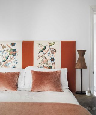 Bedroom with patterned headboard