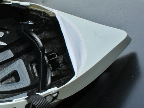 Covering the underside of the tail is wind tunnel-proven to reduce drag so Giro built it into the new design. A strip of stretchy fabric seals the area tightly against the back of the rider's head while a retention system keeps the helmet securely in place.