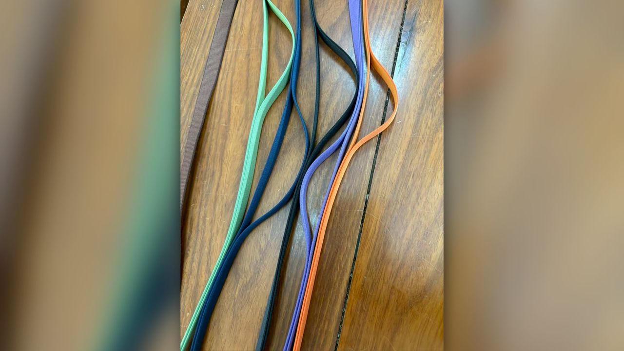 Leaked photos and renders of what is claimed to be Apple's Crossbody Strap iPhone 17 accessory.