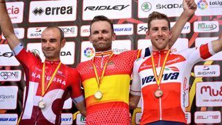 Jose Joaquin Rojas pulls on the Spanish champion's jersey