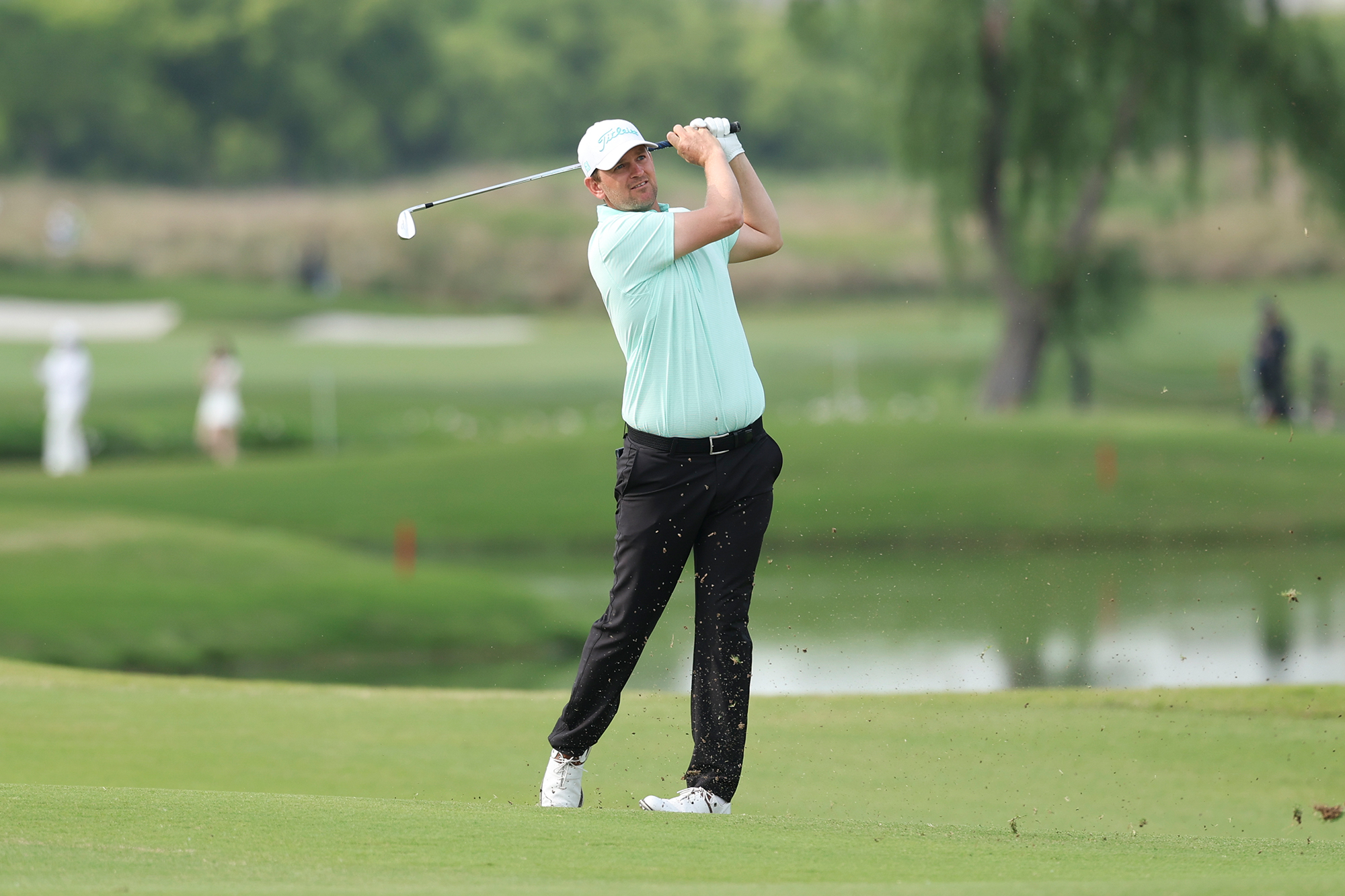 Bernd Wiesberger in the finish position after hitting an iron shot at the Volvo China Open 2026