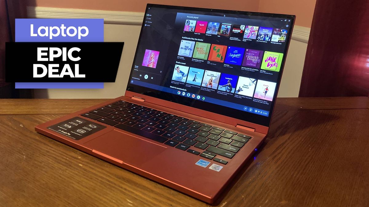 Galaxy Chromebook 2 in Fiesta Red on a wooden table