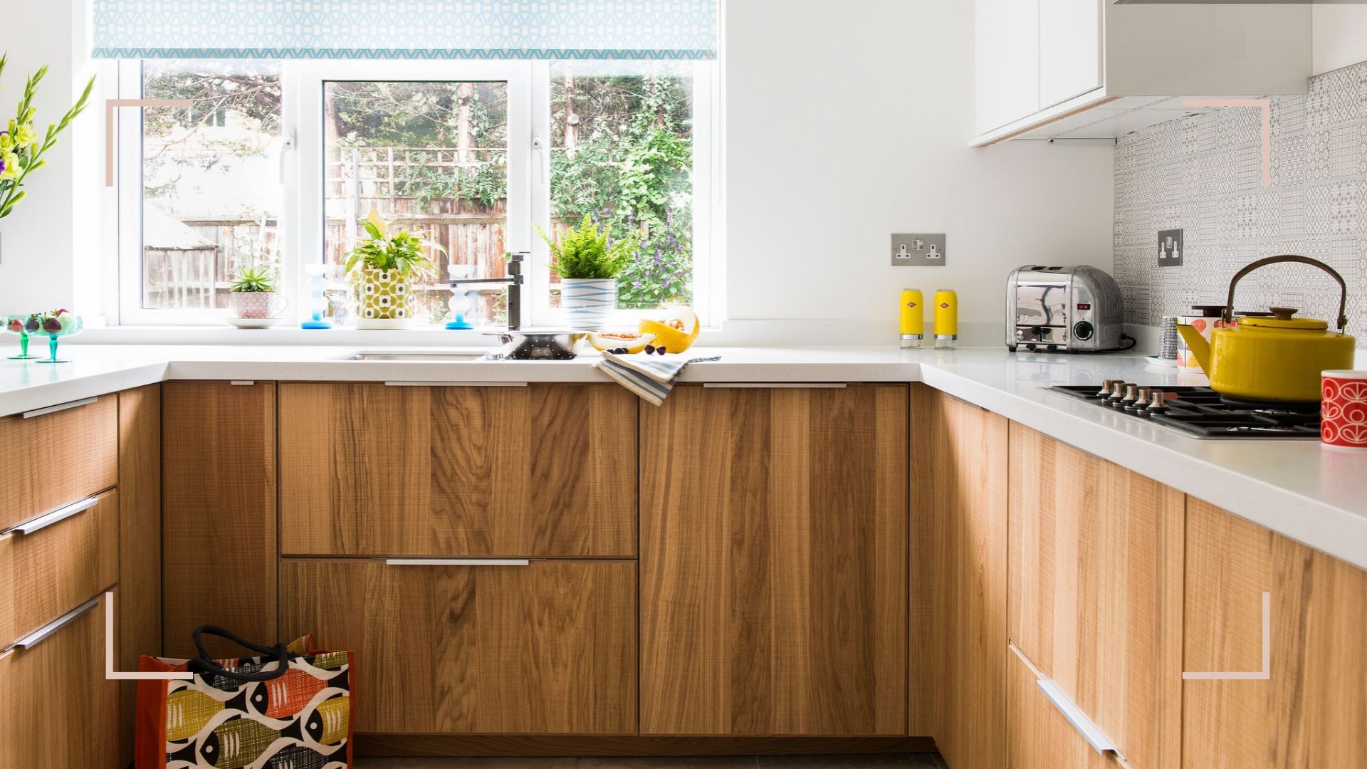 white kitchen with wooden base cabinets