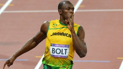 Jamaica's Usain Bolt wins the men's 200m final at the athletics event during the London 2012 Olympic Games on August 9, 2012 in London. AFP PHOTO / GABRIEL BOUYS (Photo credit should read GABRIEL BOUYS/AFP/GettyImages)