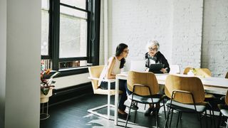 Two people meeting in an office