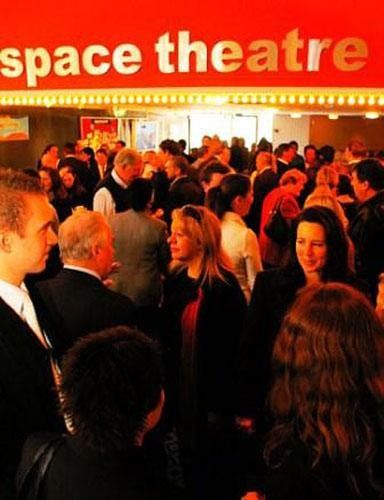 Dignitaries prepare to enter the theater